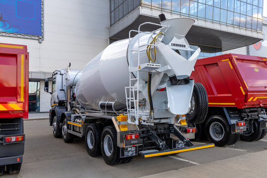 The Liebherr HTM 1004 concrete mixer truck based on the Mercedes-Benz Arocs chassis, rear view. The stand of Mercedes-Benz at the construction industry fair Bauma CTT. Russia, Moscow - May 25, 2021