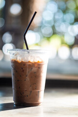 Iced coffee served on table in cafe