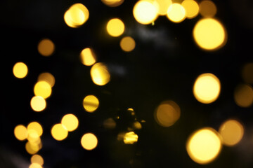 golden christmas lights bokeh dark background