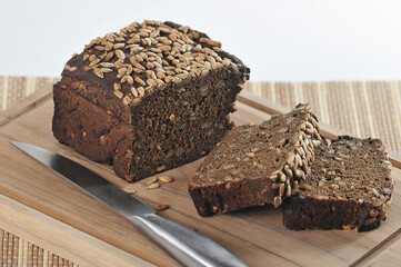 bread with sunflower seeds on a wooden board