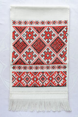 One of the types of ornament of a Ukrainian wedding towel, handmade, embroidered with red and black threads.