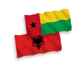 Flags of Republic of Guinea Bissau and Albania on a white background