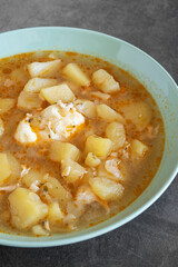 Traditional Spanish recipe potato stew with egg