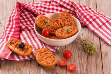 Toasted bread with tomato and oregano.