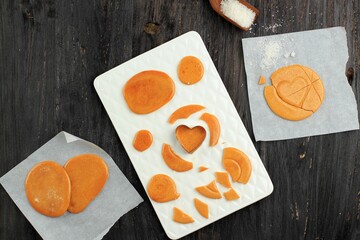 Dalgona Candy Squid Game (Ppopgi), Old Fashionaed Korean Sugar Candy with Stamp on the Center. Viral Food on Social Media.