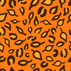 Leopard or jaguar seamless pattern made of fall leaves. Trendy animal print with autumn colors. Vector background for fabric, wrapping paper, textile, wallpaper, etc.