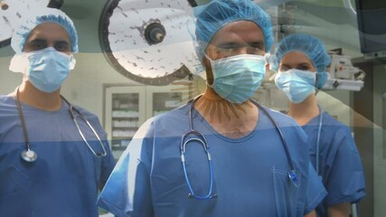 Animation of flag of argentina waving over surgeons in operating theatre - Powered by Adobe