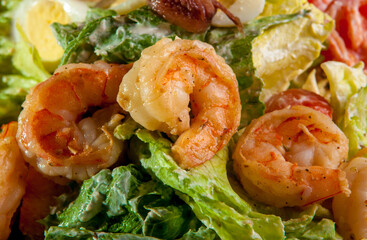 Shrimp dish on a white plate. Seafood food, delicacies.