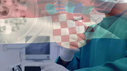 Animation of flag of croatia waving over surgeon in face masks - Powered by Adobe
