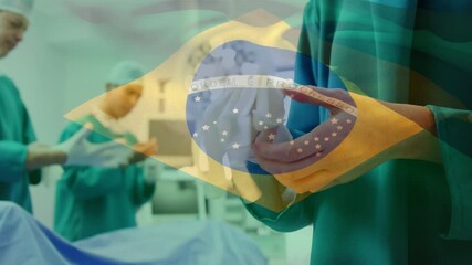 Animation of flag of brazil waving over surgeons - Powered by Adobe