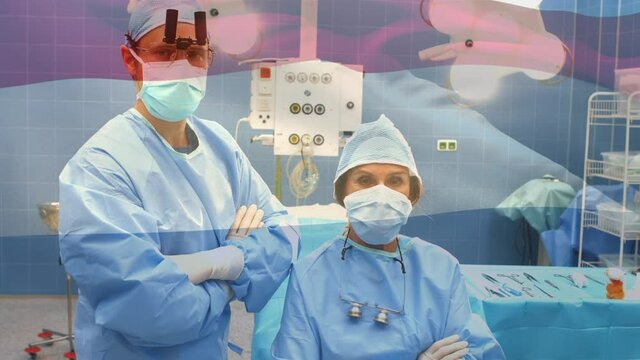 Animation of flag of netherlands waving over surgeons in operating theatre