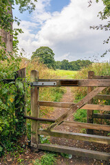 Gate to public footpath across field