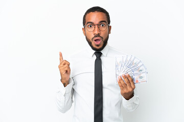 Young business latin man taking a lot of money isolated on white background intending to realizes the solution while lifting a finger up