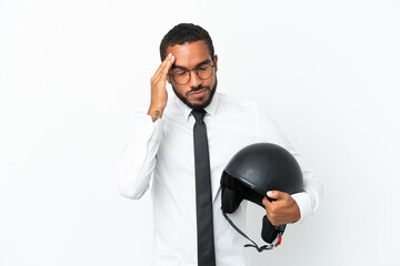 Young business latin man with a motorcycle helmet isolated on white background with headache