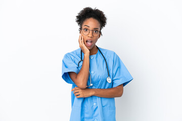 Young surgeon African American doctor woman isolated on white background surprised and shocked while looking right