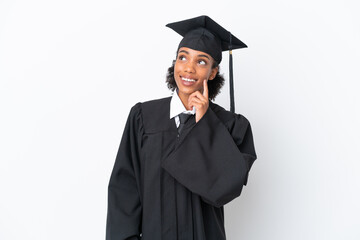 Young university graduate African American woman isolated on white background thinking an idea while looking up