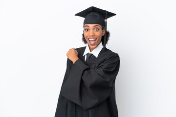 Young university graduate African American woman isolated on white background celebrating a victory