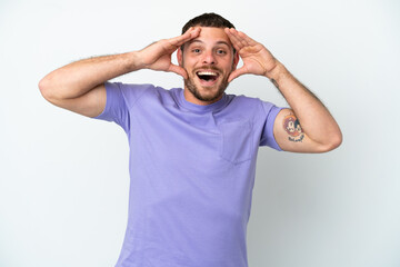 Young Brazilian man isolated on white background with surprise expression
