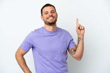 Young Brazilian man isolated on white background showing and lifting a finger in sign of the best