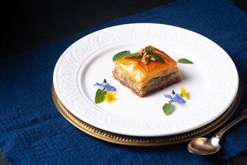 Food concept Homemade Baklava dessert on black background with copy space