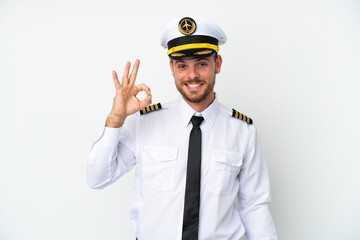 Airplane Brazilian pilot isolated on white background showing ok sign with fingers