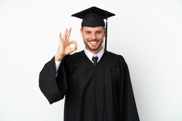 Young university Brazilian graduate isolated on white background showing ok sign with fingers