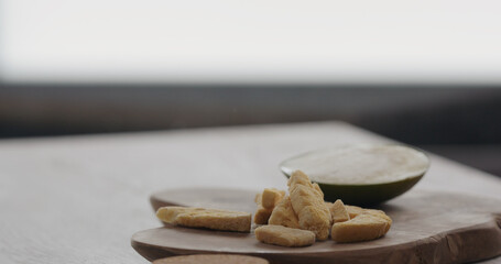 freeze dried mango on olive wood board