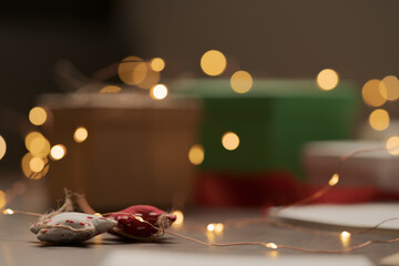 Closeup shot of textile christmas stars on walnut table