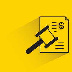 financial contract with shadow on yellow background