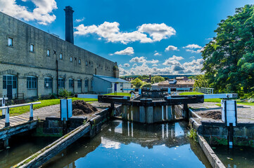 A view over a three locks network on the Leeds, Liverpool canal at Bingley, Yorkshire, UK in...