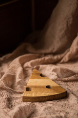 Empty kitchen cutting boards on brown background