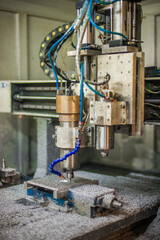 Close-up detail view of CNC milling metal engraving machine