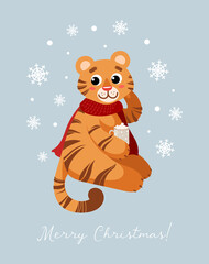 A cute tiger in a red scarf drinks cocoa. Merry Christmas. Symbol of Chinese New Year 2022. For posters, postcards, banners, printing on fabric.