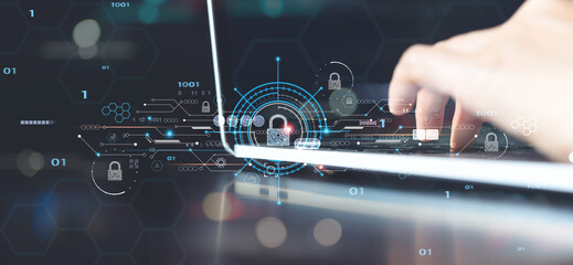 Network security, personal data privacy protection , digital crime concept. Person working on laptop computer with padlock icon and internet technology networking