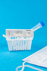 Buy express antigen test for coronavirus covid 19 self-check at home. Laboratory card corona rapid test device. Shopping pharmacy concept. Negative result. Set with medical swab nose sticks, tube 