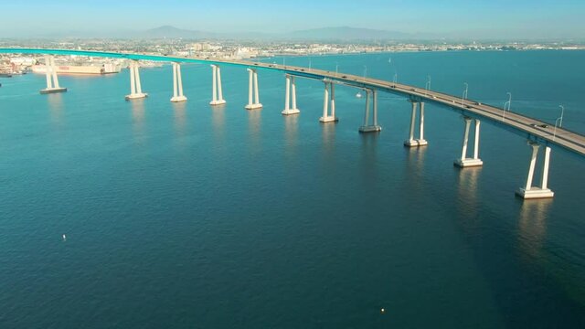 Aerial: Coronado Bridge Traffic over the San Diego Harbor. California, USA