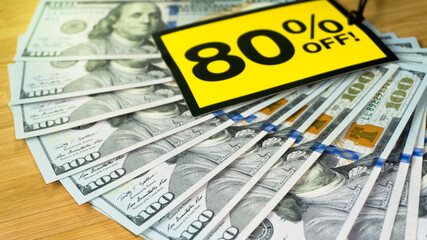 Yellow sale label on money USA dollar background. Black friday sale. American money