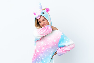 Blonde Uruguayan girl wearing a unicorn pajama isolated on white background suffering from pain in shoulder for having made an effort