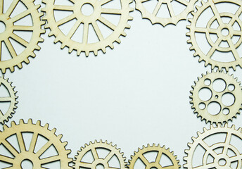Fototapeta na wymiar A picture of wooden gear with copyspace white background. New innovation and technology concept.