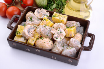 raw fish marinated in prtvin for roasting in the oven 