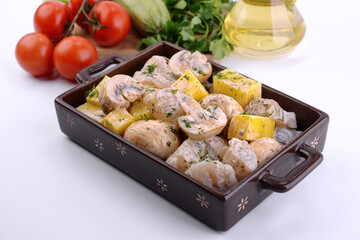 raw fish marinated in prtvin for roasting in the oven 