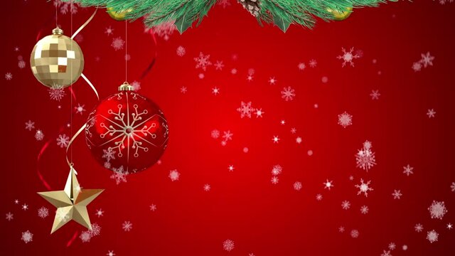 Animation of snow falling over christmas decoration on red background