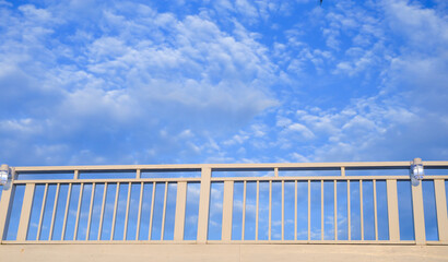 Balcony on blue sky. Background with beautiful cloud's