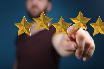 pointing five star symbol to increase rating of company