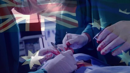 Animation of flag of australia waving over surgeons in operating theatre - Powered by Adobe