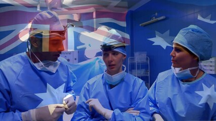 Animation of flag of australia waving over surgeons in operating theatre - Powered by Adobe