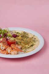 salad and omelet in a plate, tomatoes, cucumbers, greens and cabbage, diet food and drink for breakfast and lunch