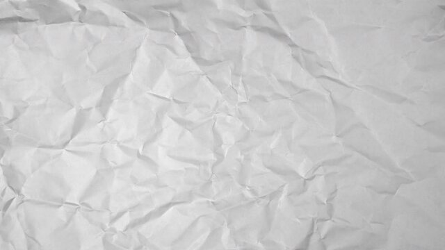Wrinkle background white paper was crumple in motion.