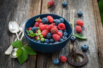 Sweet berries in summer garden. Fruits from greenhouse.