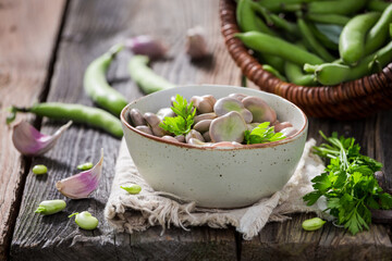 Tasty broad beans with parsley and garlic. Perfect summer snack.